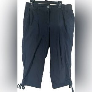 Studio works stylish black capris with tie hem. Women’s size 14